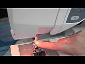 Twin Needle FM ?  |  1st spool.  On your left. Thread it all the way down through the needle on  the...