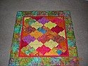 Hug with Batiks |  http://www.flickr.com/photos/28328779@N00/3562527401/This is a Hug Quilt for my...