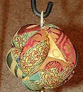 another cute pincushion or maybe an xmas tree decoration |  http://sunshinescreations.vintagethreads.com/2008/11/new-pincushion.htmlthere...