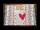 Quilted cage pads that follow shelter pets home |  This project turns leftover fabric into comfort: quilted cage pads for the cats...