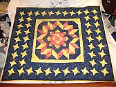 new project in the chute |  Working on a t-shirt quilt for my next door neighbor.   A couple of them...
