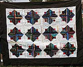 Log Cabin Quilt |  I did 12 inch blocks -- 1 1/2" unfinished strips I believe.   Lots and lots of...