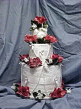 cake made with towels |  I am in need of instructions for a centerpiece usingbath towels to look like a...