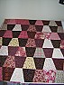 First Baby Quilt of 2010 |  Done.I have just put together a tumbler top using 3 charm pack from Freshly...