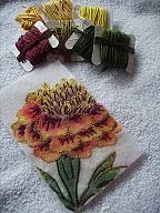 Re: Embroidered Marigold-Bold |  is:http://curiosities808.wordpress.com/2008/07/01/group-embroidery-proje...That...