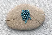 Tutorial for beading on quilts |  Thanks for posting that link.  I have a quilt that I am considering doing some...