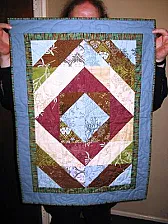 Small happy dance for a small quilt |  Jo: It is too hot here to dance, but I will hum a happy tune for your delightful...